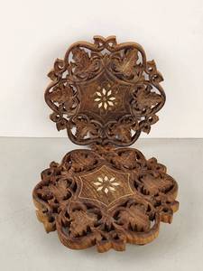 lot 309 image: Pair of Carved Wooden Trivets