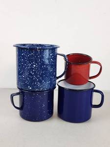 lot 317 image: 4-Piece Enamel Cookware Set Blue Speckled Red Mug