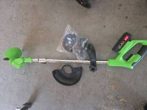 lot 55 image: Cordless Weed Wacker Pre Owned  - Retail $0