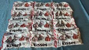 lot 2052 image: Hersheys Kisses Candy Cane Flavored Chocolate Candy 12 count