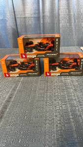 lot 3036 image: Bburago McLaren Formula 1 Team 143 Scale Diecast Models Lot of 3