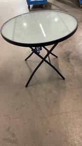 lot 3090 image: Round Folding Table with Glass Top Black Frame