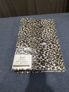 lot 170 image: 4 X 6 SLIMLINE LEOPARD PRINT PHOTO ALBUM HOLDS 300 PHOTOS