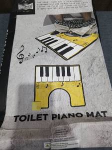 lot 179 image: TOILET PIANO PLAYING MAT