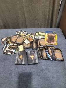 lot 211 image: Magic The Gathering Card Lot with Deck Boxes and Sleeves