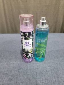 lot 349 image: God Is A Woman by Ariana Grande and Rainkissed Leaves Body Mist Spray Lot 2 Partially Full