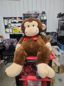 lot 259 image: Plush Monkey Stuffed Animal Brown Red Bow