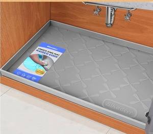 lot 47117 image: Waterproof Under Sink Mat 34 x 22, Silicone Mat Kitchen liner, BPA-Free Silicone Tray with Raised Lip - Retail $16