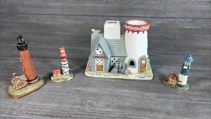 lot 143 image: Lighthouse Figurine Collection 4 Piece Lot