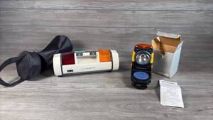 lot 157 image: The Leading Edge Auto Emergency Light with Adva-Lite Emergency Light Lot