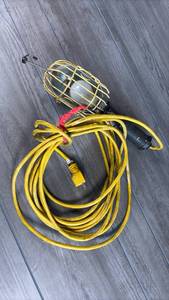 lot 165 image: Portable Work Light with Yellow Extension Cord and Cage Guard