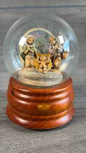 lot 186 image: Nativity Snow Globe Music Box with Wooden Base
