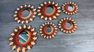 lot 194 image: Sun Moon Face Mirror Wall Decor 6 Piece Set