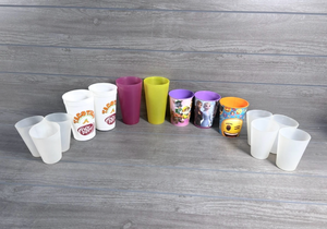 lot 234 image: Mixed Plastic Cups Lot Dr Pepper Taco Bell Frozen Paw Patrol Emoji