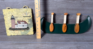 lot 264 image: Lighthouse Decorative Ornament with Green Canoe Candle Holder Set