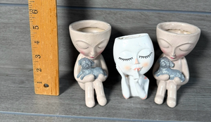 lot 269 image: 3 Decorative Face Planters with Dog Figures, Approximately 4 Inches