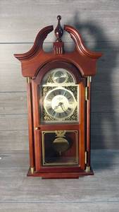 lot 378 image: Wall Clock with Pendulum, Moon Phase Dial, and Roman Numerals