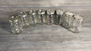 lot 399 image: 8 Clear Glass Canning Jars with Metal Lids and Bands