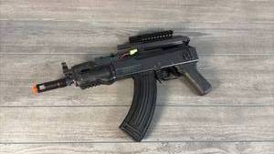 lot 460 image: Cybergun Colt M4A1 RIS Airsoft AEG Rifle with Magazine and Accessories