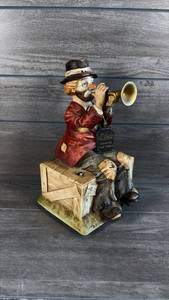 lot 508 image: Melody Hand-Painted Bisque Porcelain Man with Trumpet Musical Figurine