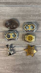 lot 520 image: &nbspBelt Buckles, Star Sheriff Badge, Figure