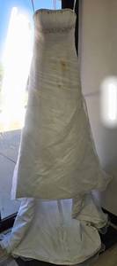 lot 906 image: Ella Rosa Strapless Wedding Dress with Beaded Embellishment, Size 10 Very Beautiful. Needs Cleaned.