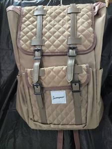 lot 953 image: Journeyman Quilted Tan Backpack with Front Pocket