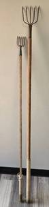 lot 960 image: Fishing or Frog Gigger with Wooden Handles, 6 ft and 4 ft.
