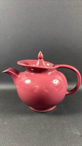 lot 27 image: Red Mauve Hall Ceramic Windshield Teapot with Lid and Handle