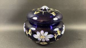 lot 49 image: Fenton Hand Painted by S. Hopkins Purple Glass Covered Jar with Floral Decoration