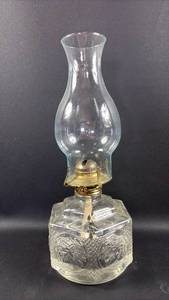 lot 90 image: Vintage Oil Lamp with Clear Glass Chimney and Embossed Base