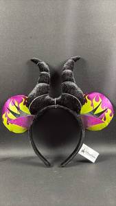 Disney Parks Maleficent horn and flame Minnie Mouse ear headbands featuring black sparkly horns and purple and green flaming ears