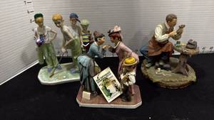 lot 1018 image: Norman Rockwell, Saturday Evening Post and Adolf Gund porcelain figurines tallest is 7 inches