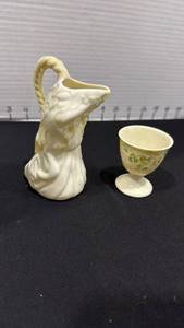 lot 1040 image: Belleek Undine Water Nymph Creamer pitcher and Belleek Pottery porcelain egg cup