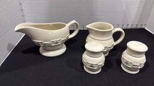 lot 1061 image: Longaberger green gravy bowl, blue creamer with salt and pepper shakers