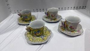 lot 1077 image: Butterfly teacups and saucers