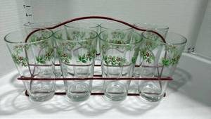 lot 1082 image: 8 Holiday glasses with red caddy