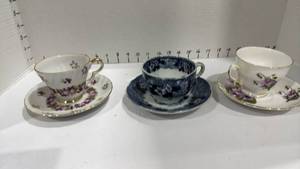 lot 1110 image: Lefton tea cup and saucer with tea cups and saucers