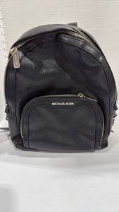 lot 1126 image: Michael Kors backpack purse