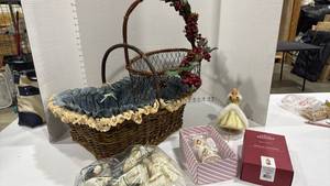 lot 1169 image: Hallmark Santa Claus ornament, Barbie stocking holder, angel lights and baskets