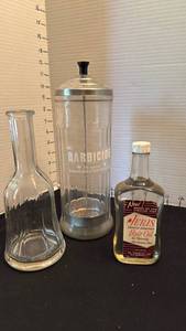 lot 1252 image: Barbicide disinfectant jar, Jerris hair oil and bottle