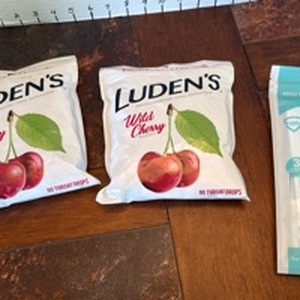lot 2011 image: 2 Ludens wild cherry throat drops unopened and 3 ply disposable face masks unopened