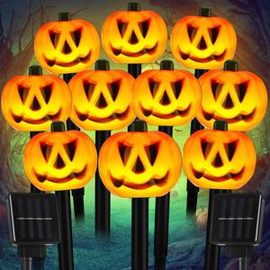 lot 1122 image: Retisee 10 Pcs Halloween Pumpkin Solar Lights Waterproof Jack O Lantern - Retail $24