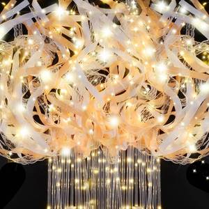 lot 144 image: HONLYNE 58 PCS Wedding Wands with Lights,Fairy Wands, LED Silk Fairy Wand with Bells for Wedding Send Off, New Year, Raves, Concert, Birthday - Retail $36