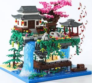 lot 239 image: Yushinv Cherry Blossom Tree Building Set with Gift Box, Original Music Cherry Blossom Tree House(Type Symphony), Japanese Sakura Tree House Lights Building Kit3320 Pcs, Cherry Bonsai Building Set.
