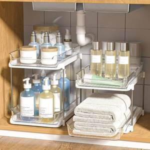 lot 320 image: Delamu 2-Tier Multi-Purpose Bathroom Under Sink Organizers and Storage, Stackable Kitchen Pantry Organization, Pull Out Medicine Cabinet Organizer with Movable Dividers, White, 2 Pack - Retail $40