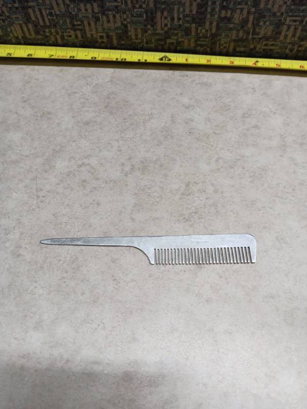 lot 1064 image: Steel Tail Comb Hand Made in Japan