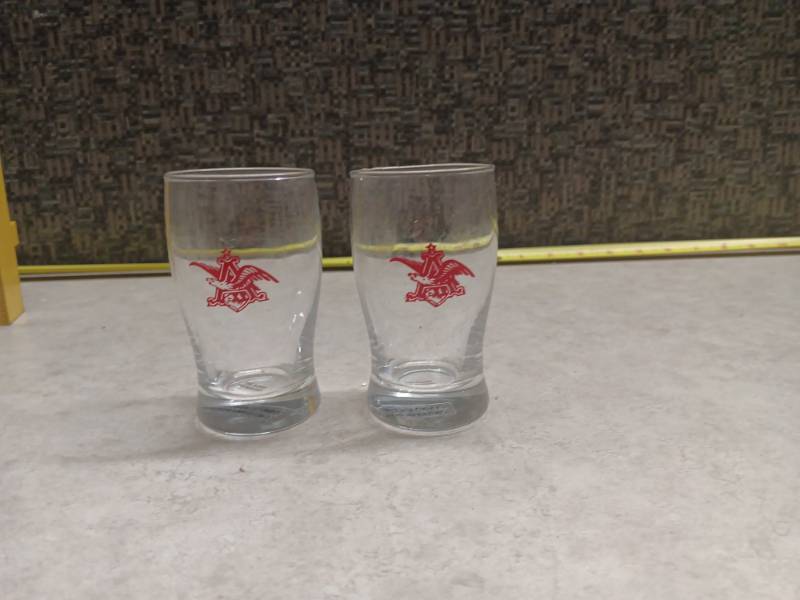 lot 1264 image: Anheuser-Busch Red Eagle Logo Drinking Glasses Set of 2