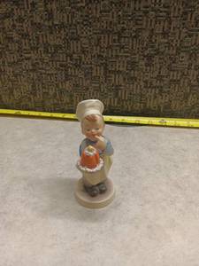 lot 1277 image: Vintage Porcelain Chef Figurine w Orange Cake