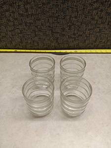 lot 1293 image: Set of 4 Glass Jars with Ridged Sides